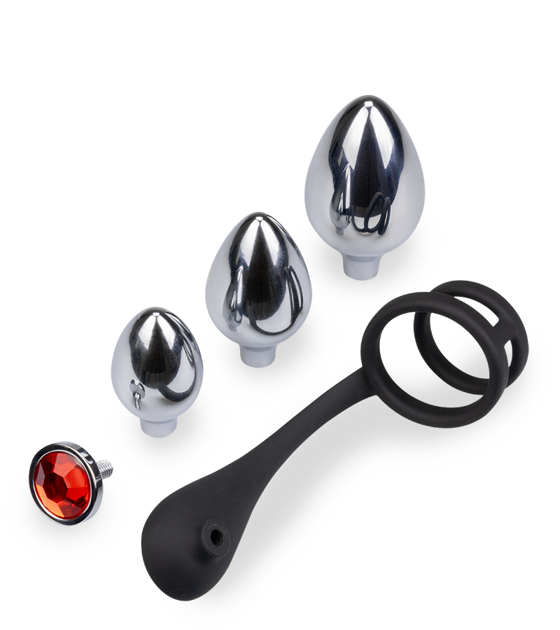 Analschmuck mit Doppel-Cockring und 3 Plugs